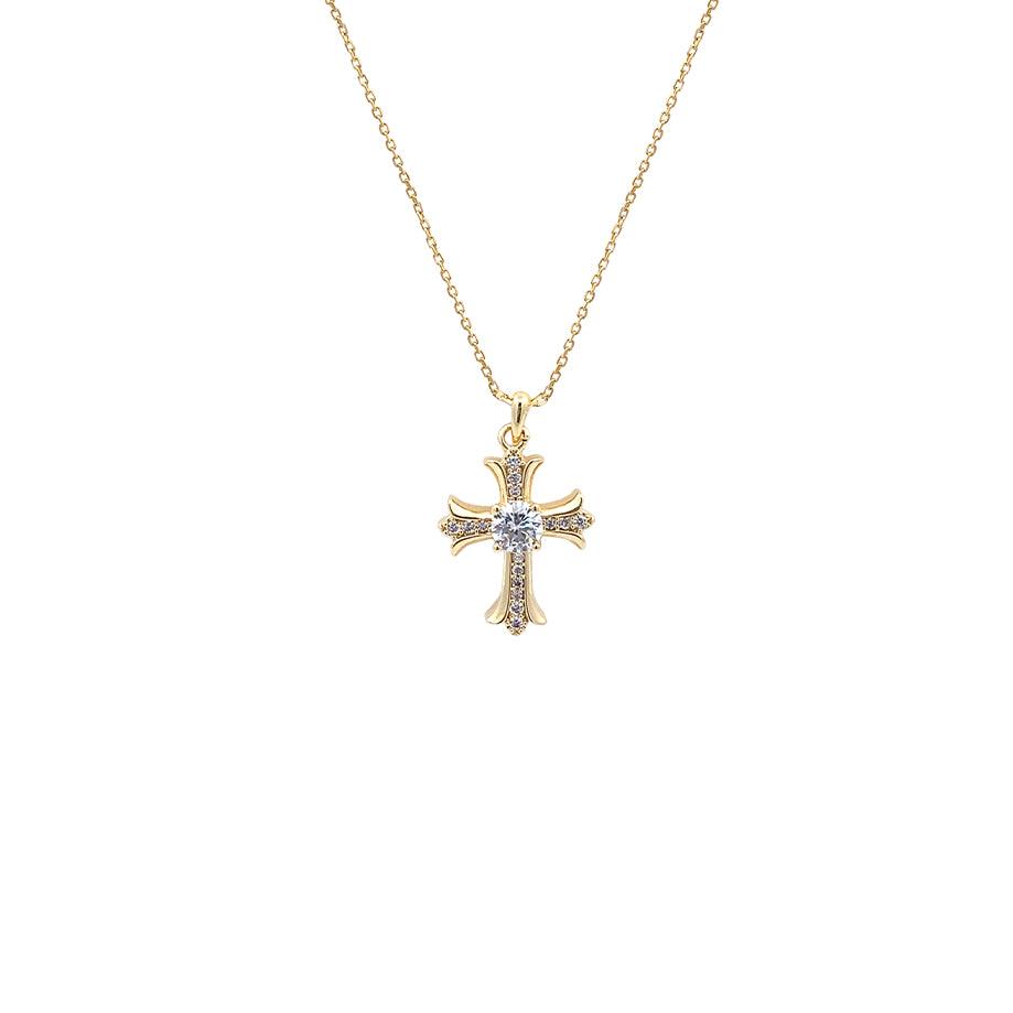 Gold plated cubic zirconia cross pendant necklace with sparkling stones on a delicate chain featuring an interlocking ring clasp.