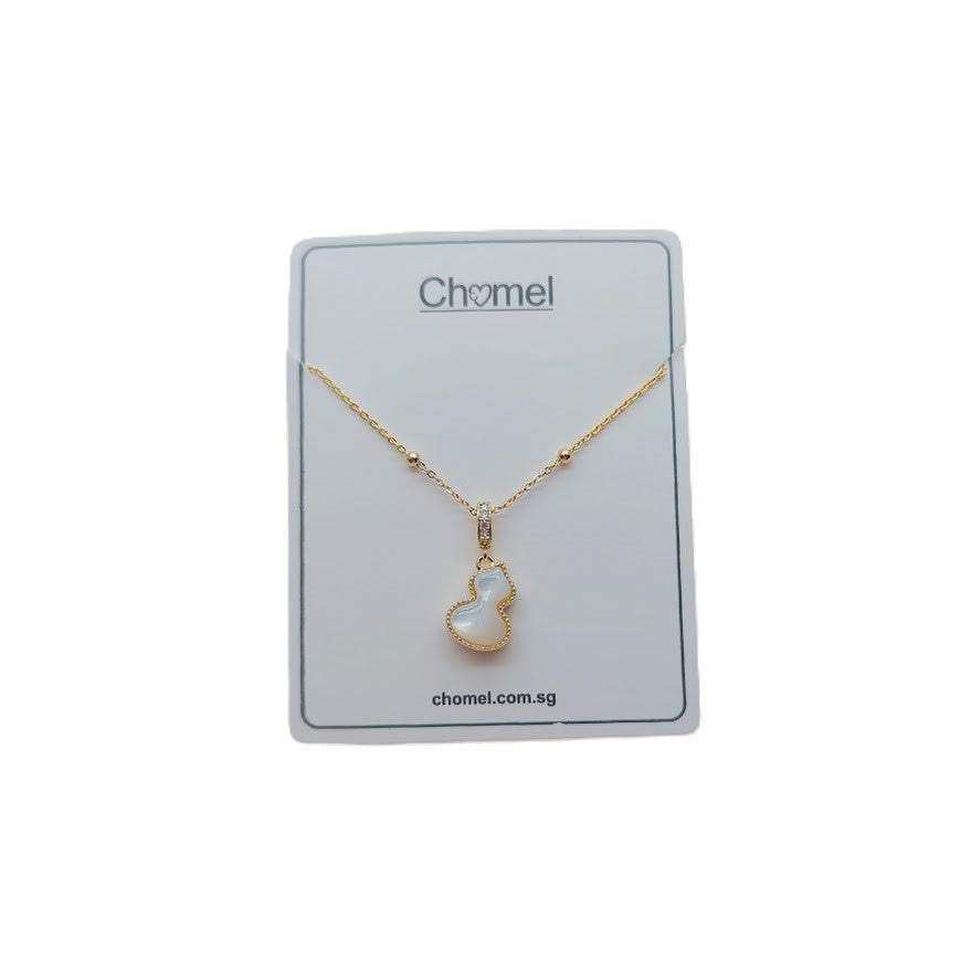 Gold-tone chain necklace with a sparkling outlined hulu-shaped pendant; Dream Catcher Cubic Zirconia Necklace with a pale centre.