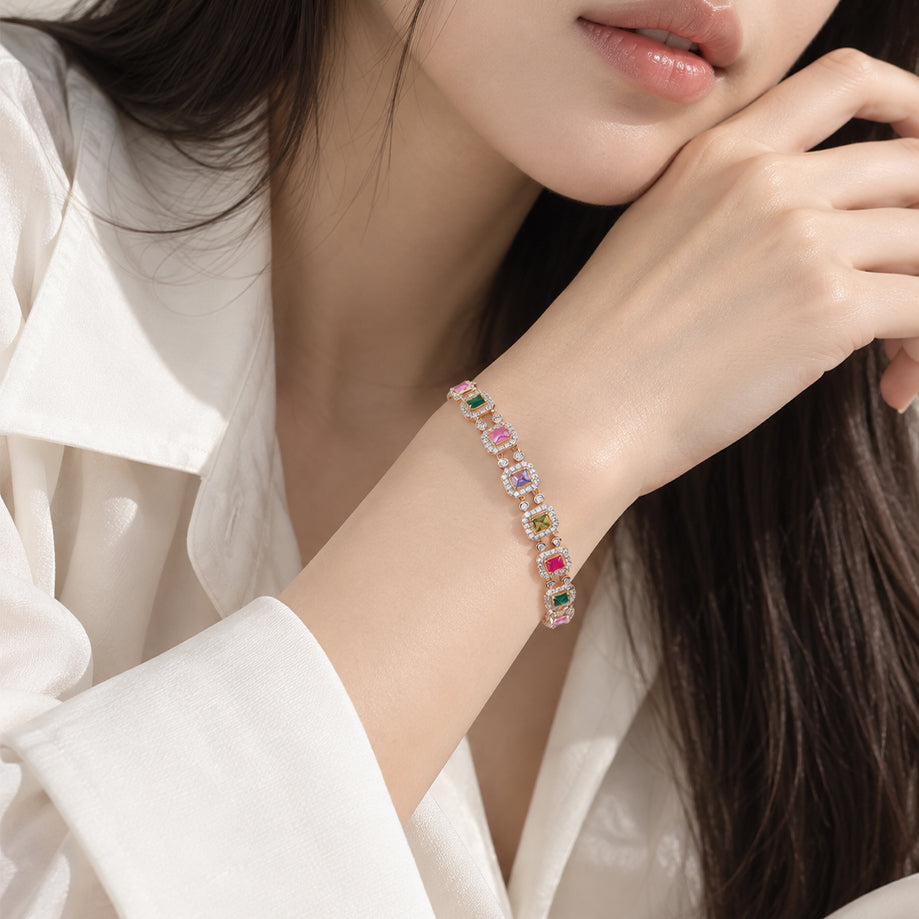 Cubic zirconia tennis bracelet with colourful stones in square settings and rosegold plated finish