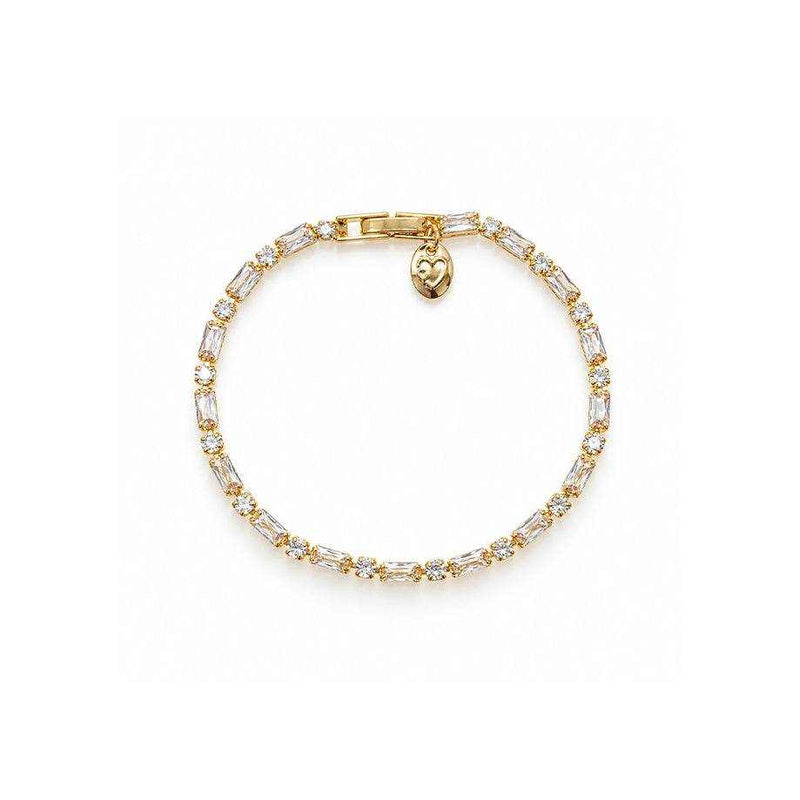 Cubic Zirconia Tennis Bracelet in gold-tone metal with a single row of clear baguette-cut stones and a heart charm
