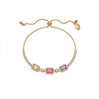 Adjustable gold-tone cz bracelet with three colorful rectangular stones and rows of sparkling clear accents.