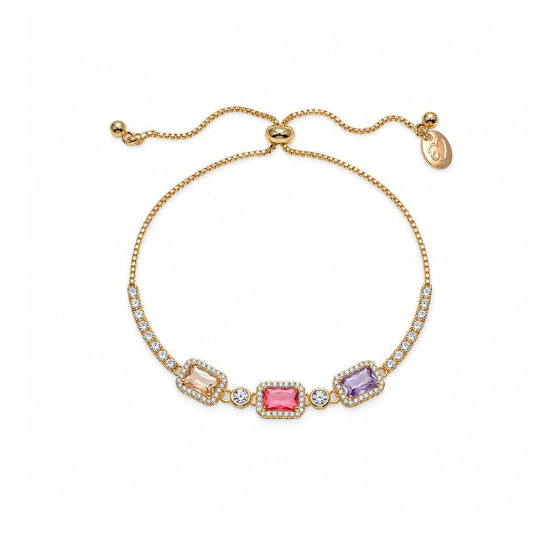 Adjustable gold-tone cz bracelet with three colorful rectangular stones and rows of sparkling clear accents.