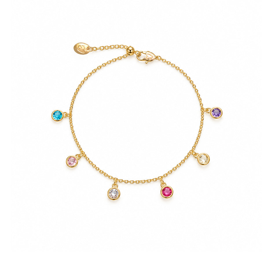 Colorful cubic zirconia tennis bracelet with gold-plated rims on adjustable chain