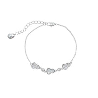 Silver-toned cz bracelet with a fine chain, a mother-of-pearl gourd charm, and sparkling cubic zirconia accents.