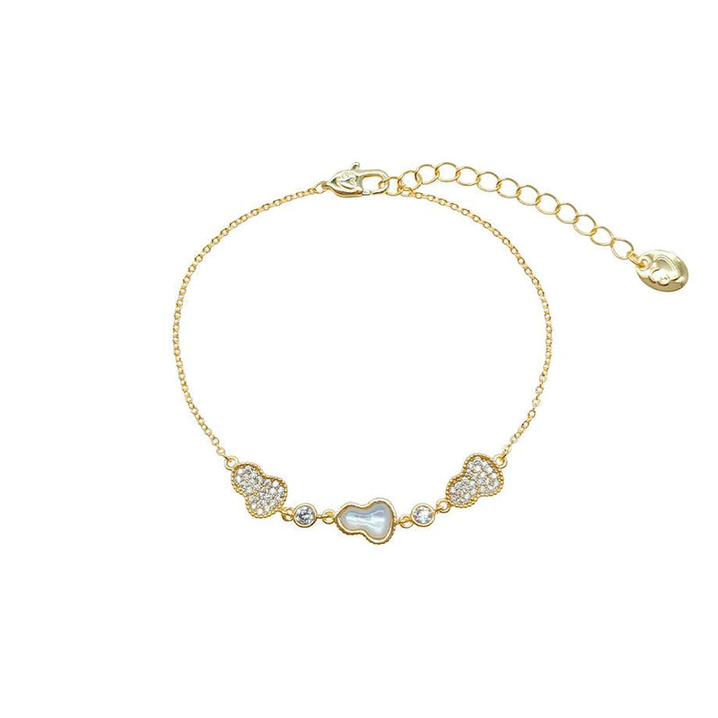 Gold-plated cz bracelet with a fine chain, sparkling cubic zirconia gourd motifs and a pearly heart-shaped centre charm