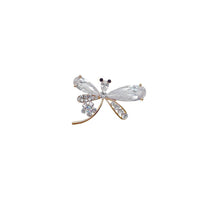 Gold plated dragonfly brooch with cubic zirconia and flower accent