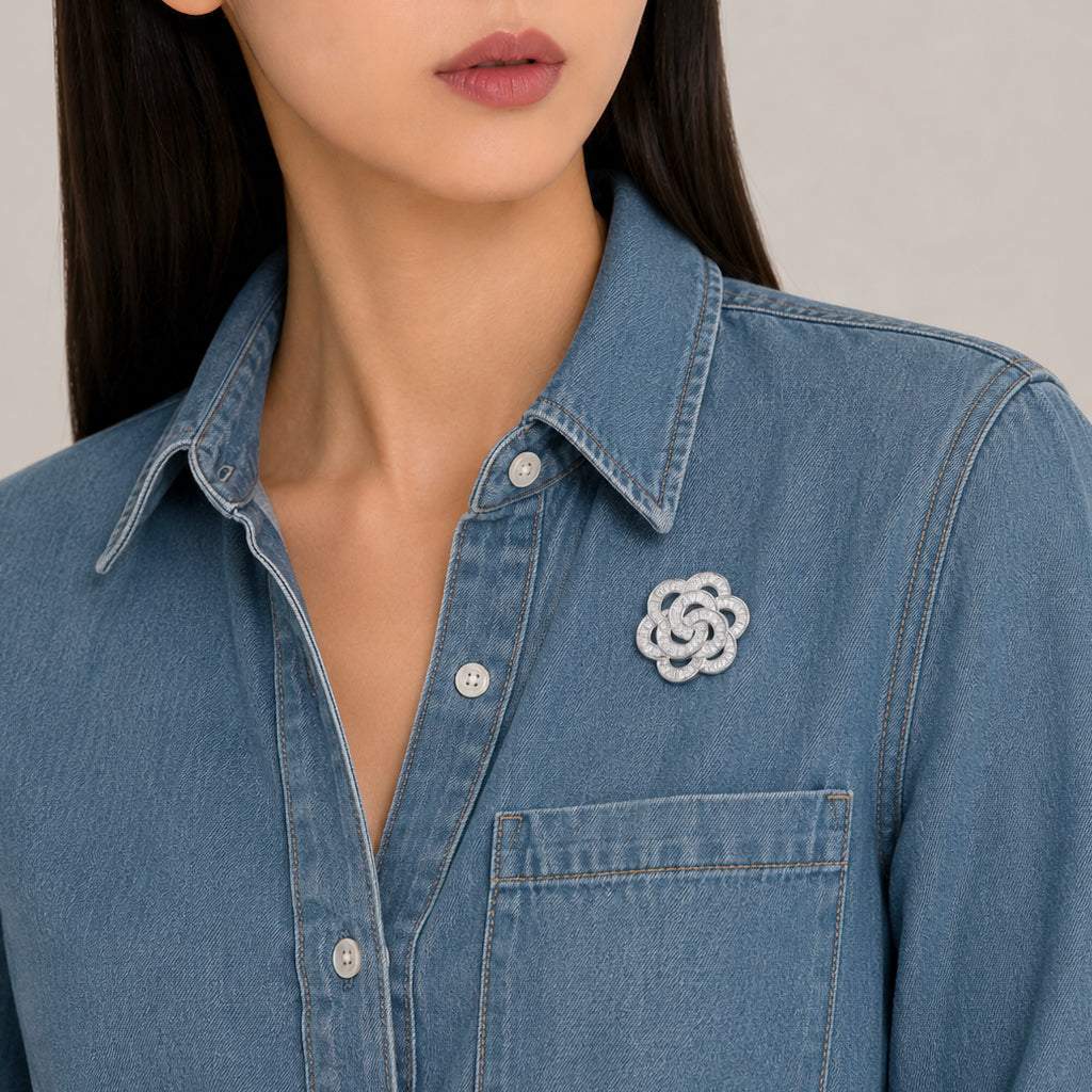 flower cubic zirconia brooch with baguette cut stones and rhodium plating