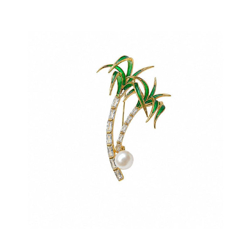 gold-plated flower freshwater pearl brooch with green enamel palm trees and cubic zirconia