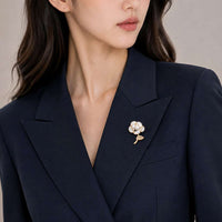 flower freshwater pearl brooch with mother of pearl petals and gold plating