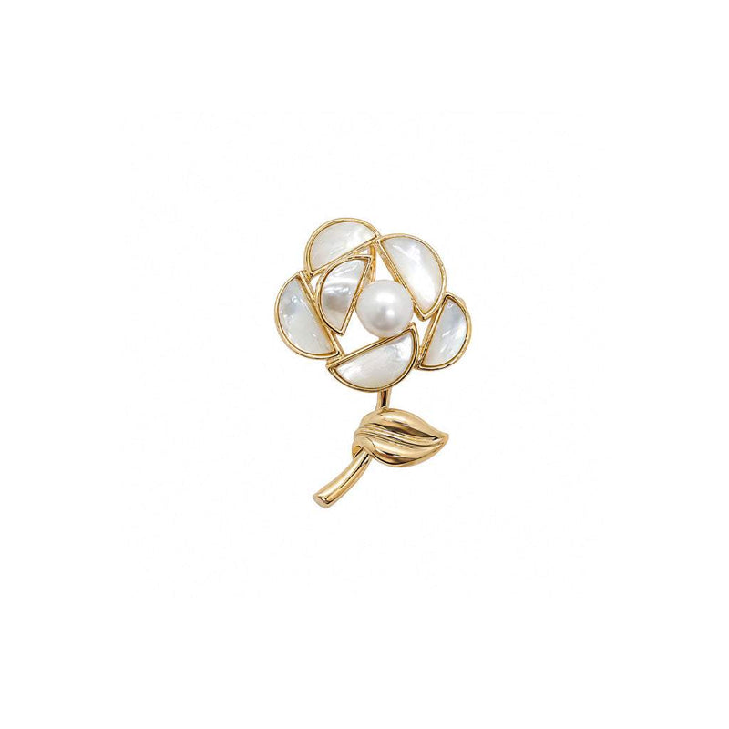 Flower freshwater pearl brooch with mother of pearl petals and gold plating