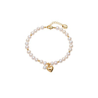Freshwater Pearl Bracelet with lustrous white pearls, small gold beads, and a polished gold heart charm.