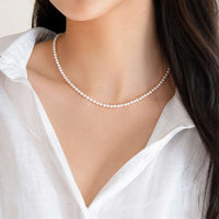 freshwater pearl choker necklace with roundish pearls and rhodium clasp