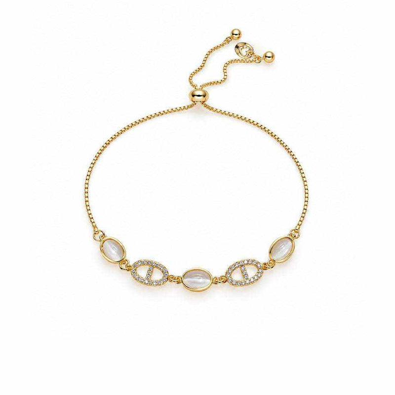Gold bracelet with a fine adjustable chain, three oval white moonstone-like cabochons and sparkling oval accents
