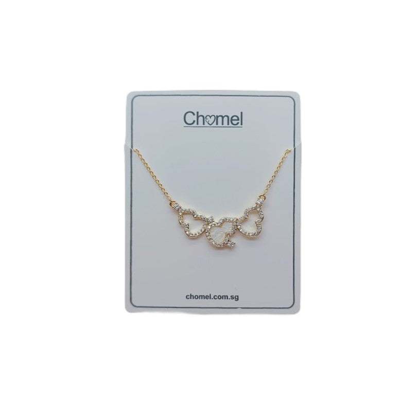 Gold pendant necklace with a delicate chain and three linked hulu-shaped charms set with sparkling clear stones