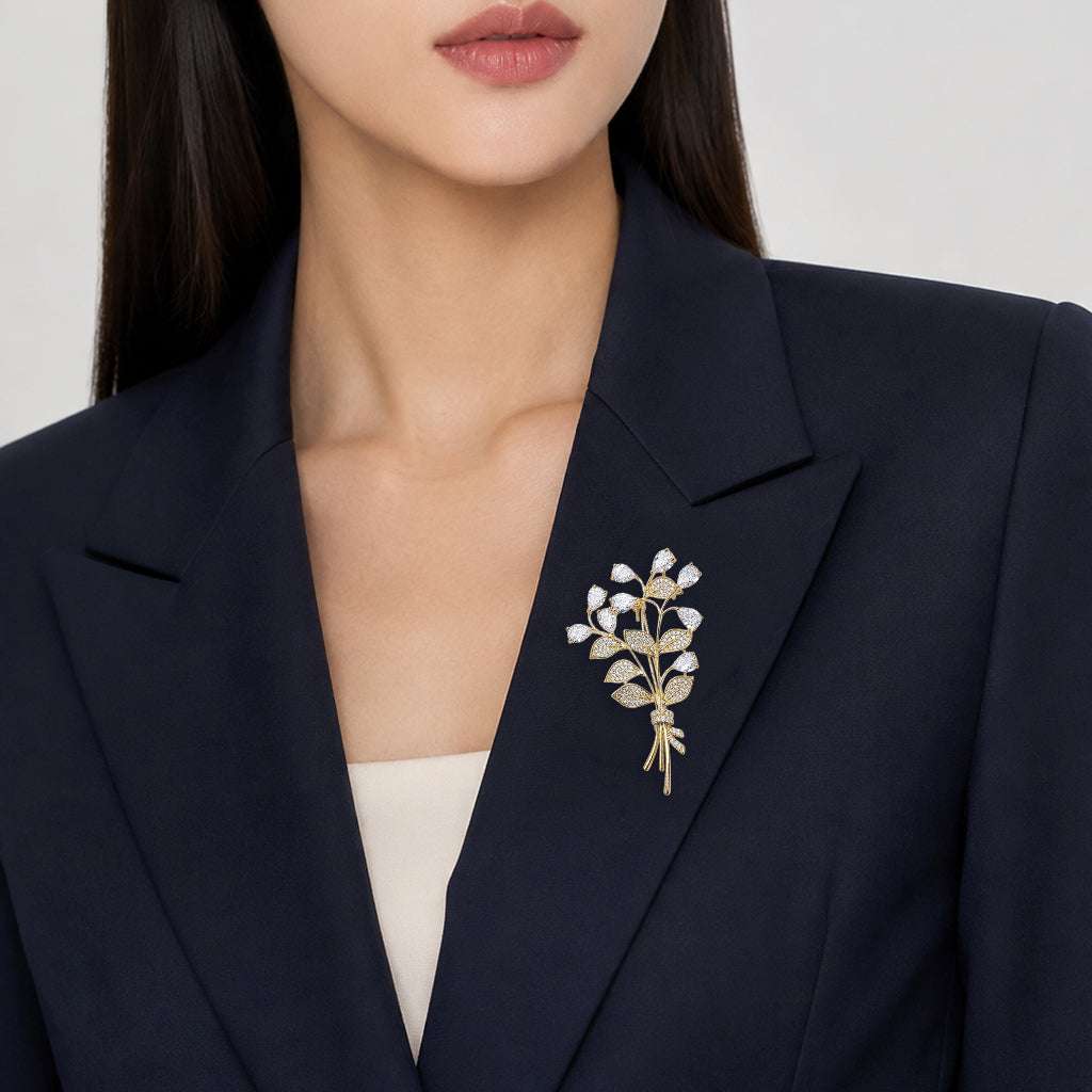 Gold plated leaf cubic zirconia brooch with sparkling stones