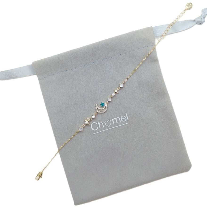 Gold-plated moon and star cubic zirconia bracelet with adjustable chain length