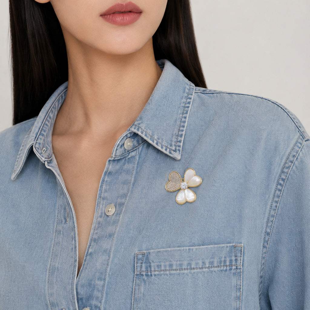 Gold plated mother of pearl and cubic zirconia clover brooch