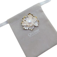 White enamel flower brooch with gold-plated edges and simulated pearl center, 5.1cm x 4.6cm, elegant freshwater pearl accessory