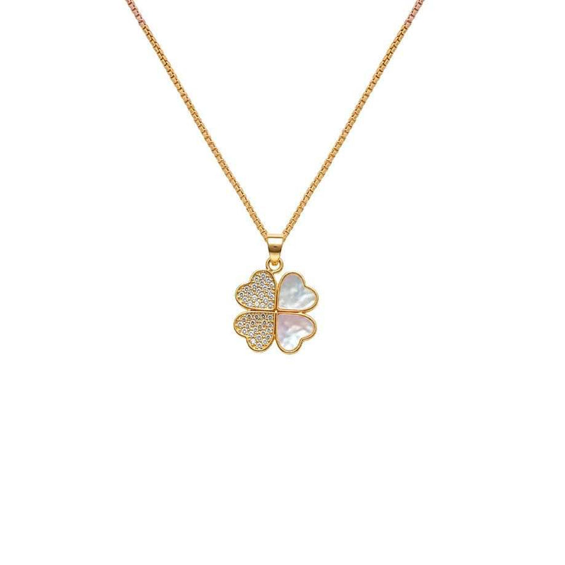 pendant necklace with a gold-toned chain and clover charm, featuring white mother-of-pearl petals and sparkling stones