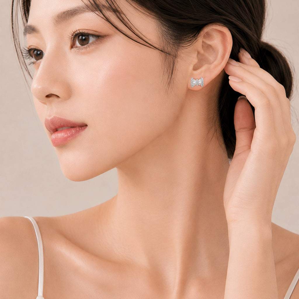 Elegant ribbon cubic zirconia stud earrings rhodium plated