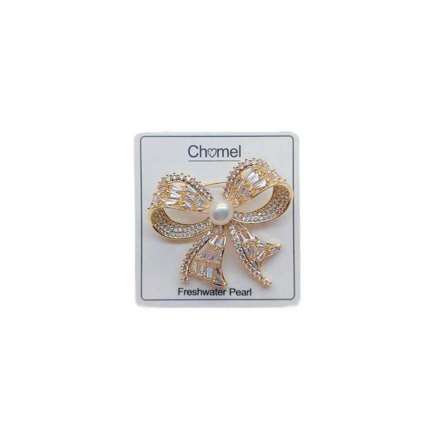 Gold ribbon freshwater pearl brooch with cubic zirconia accents