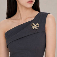 Gold plated ribbon freshwater pearl brooch with cubic zirconia
