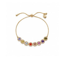 Gold-tone slider bracelet with a delicate chain and multicoloured round stones in sparkling halo settings along the front.