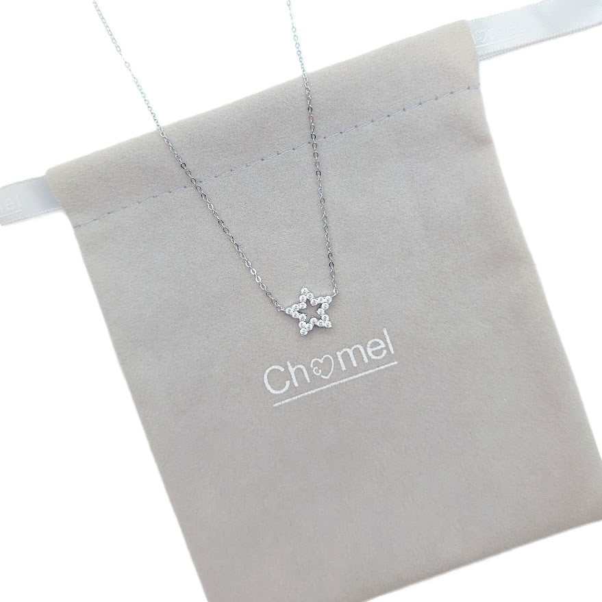 Star Pendant Necklace in silver-tone metal with a delicate chain and small clear clustered star-shaped pendant
