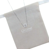 Star Pendant Necklace in silver-tone metal with a delicate chain and small clear clustered star-shaped pendant