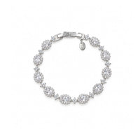 Cubic Zirconia Tennis Bracelet with rhodium plated finish featuring oval brilliant stones surrounded by small stones in a delicate design.