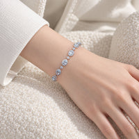 Cubic Zirconia Tennis Bracelet featuring round brilliant clear stones in a silver rhodium plated setting on a wrist