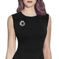 Leaf cubic zirconia brooch with rice-shaped stones, rhodium plated, 3.8 cm round on black dress
