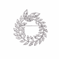 Leaf cubic zirconia brooch with rhodium plating and rice-shaped stones, 3.8 cm round design