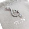 Music Note Cubic Zirconia Brooch.