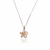 Flower simulated moonstone necklace with rose gold plated flower pendant and crystal accents on chain