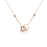 CHOMEL Cubic Zirconia Interlocking Heart & Ring Rosegold Necklace