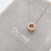 Tunnel cubic zirconia necklace with rosegold pendant engraved LOVE on chain