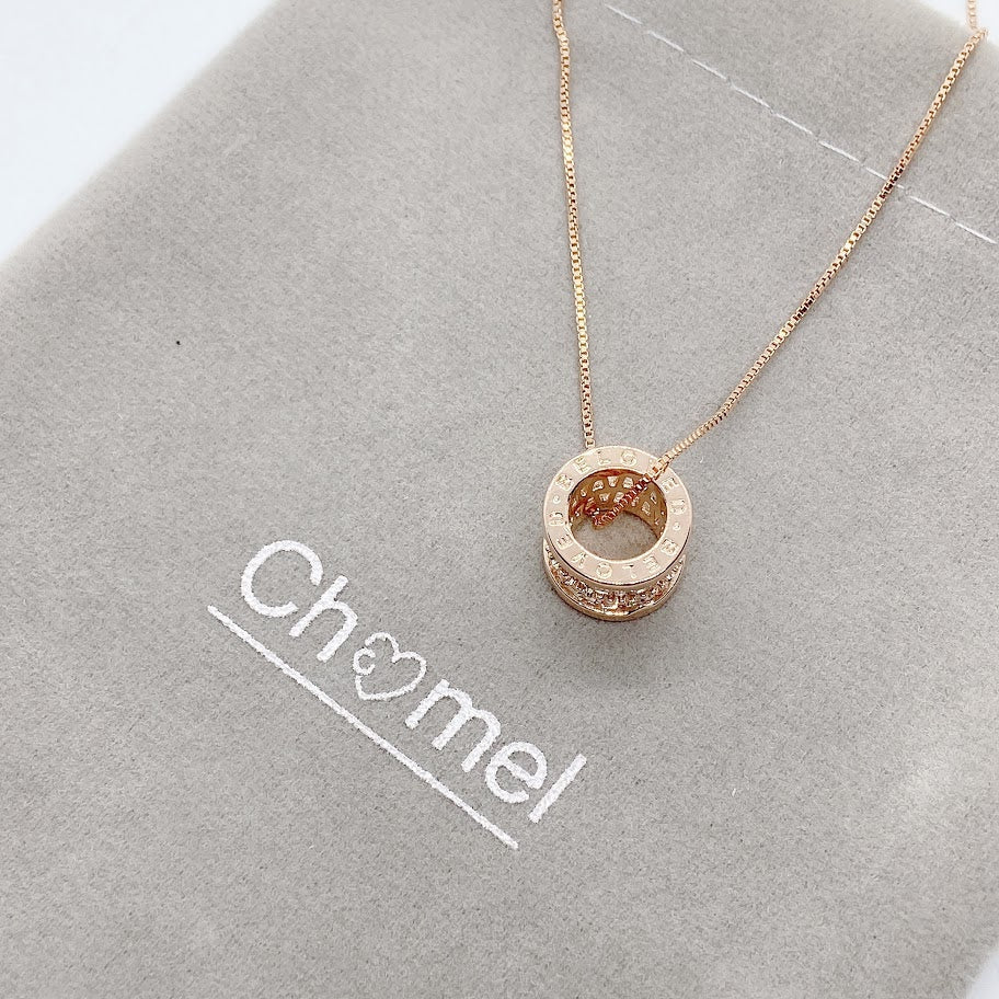 Tunnel cubic zirconia necklace with rosegold pendant engraved LOVE on chain
