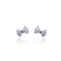 Ribbon cubic zirconia stud earrings with rhodium plated finish and post backings, 1.2cm x 0.9cm size