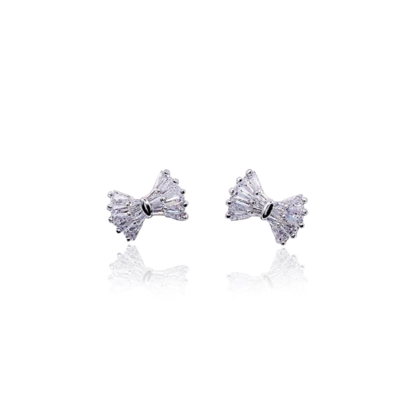 Ribbon cubic zirconia stud earrings with rhodium plated finish and post backings, 1.2cm x 0.9cm size