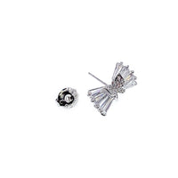Ribbon cubic zirconia stud earring with butterfly center rhodium plated 9x15mm with post backings