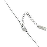 Close-up of ballerina cubic zirconia necklace chain with rhodium plated finish and spring clasp closure