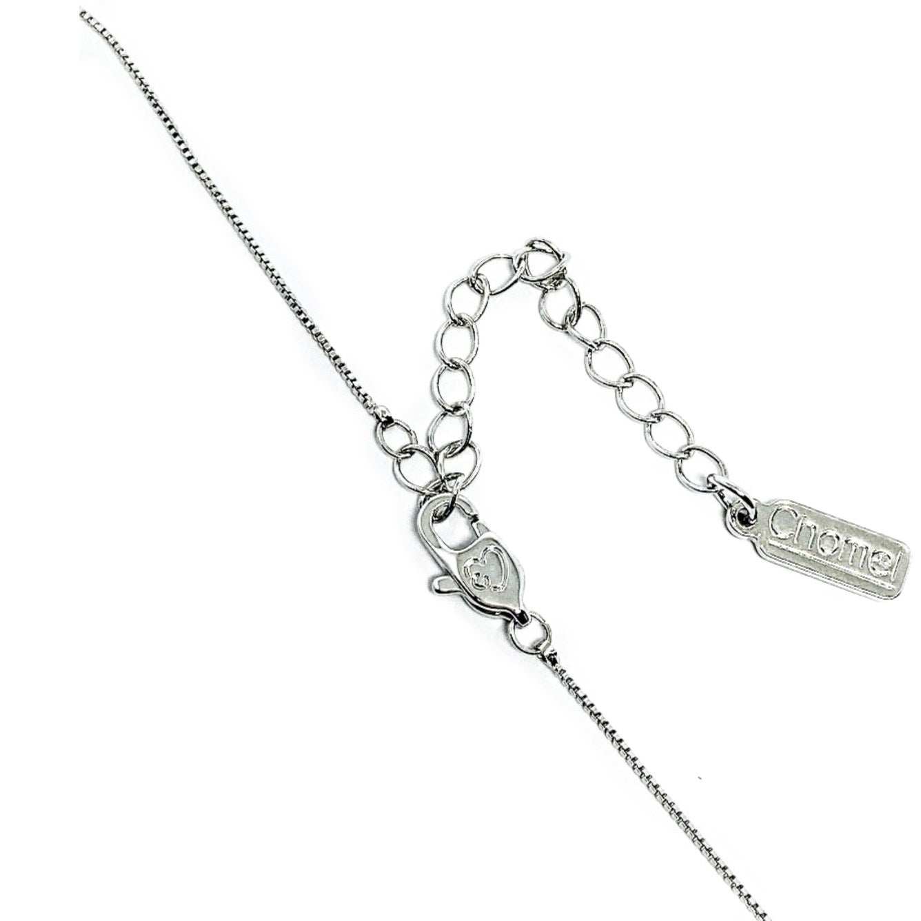 Close-up of ballerina cubic zirconia necklace chain with rhodium plated finish and spring clasp closure